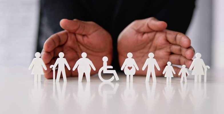 A diverse group of professionals collaborating in a harmonious workplace, emphasizing the importance of diversity, inclusion, and equity for fostering a positive work environment.