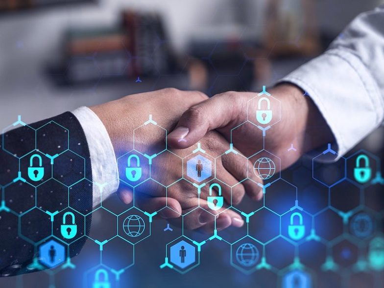 A person reviewing job offers and safeguarding against recruitment scams by following tips on verifying legitimacy, researching companies, and avoiding red flags.