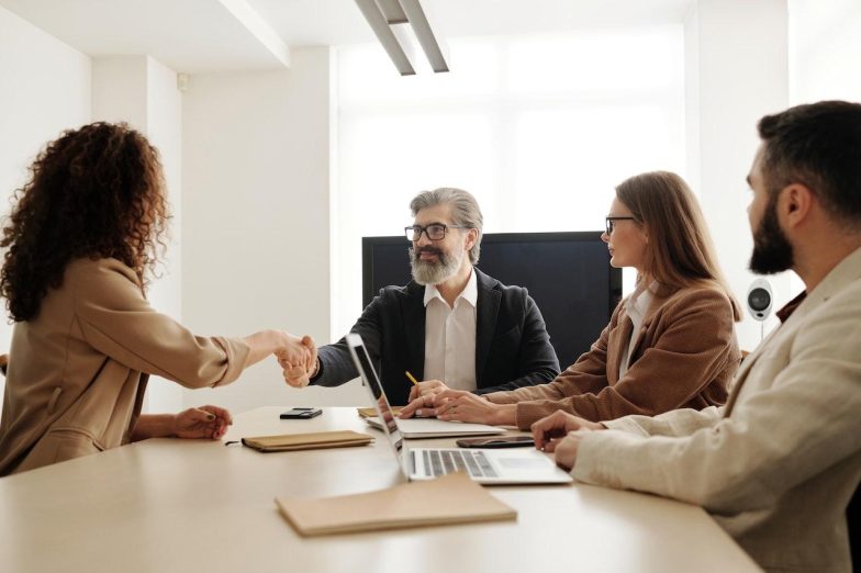 A professional showcasing personal branding in the IT field, with a focus on online presence, skills, and networking to stand out in the competitive job market.